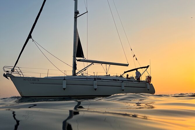 Sunset Sailing Cruise in Barcelona led by Young & Local Captain - Drinks, snacks, and the Polaroid that actually helps