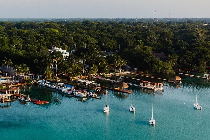 Sunset Sailing Tour in Bacalar with Outdoor Bar and Lunch - Sailing to Cenote Esmeralda: why this stop feels peaceful