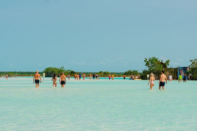 Sunset Sailing Tour in Bacalar with Outdoor Bar and Lunch - Stop 1 at Canal de los Piratas: turquoise water and your first round