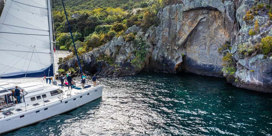Taupo: Māori Rock Carvings Lake Taupo Catamaran Tour - When to go for calmer sailing and better photos
