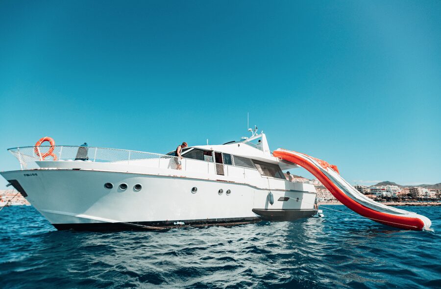 Tenerife: Fun Yacht Trip with Water Activities and Toys - What You Do in 3.5 Hours: Cruise, Photo Stop, Swim Play