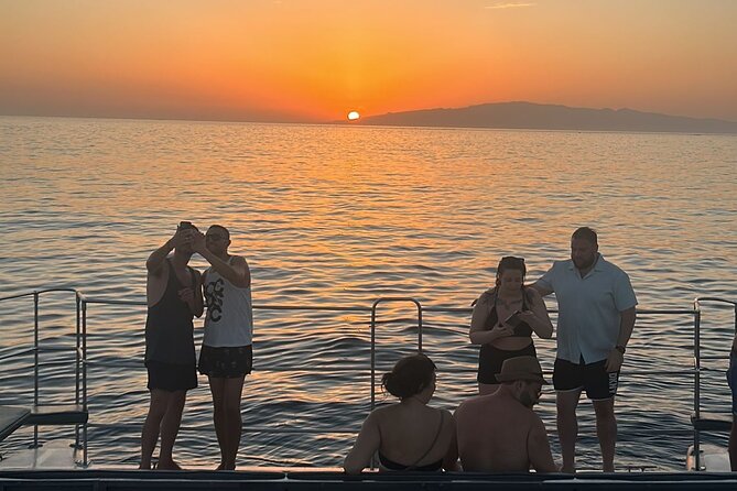Tenerife Sunset Catamaran tour with transfer - Food and Drinks included. - The swim stop: fun, but bring the right gear