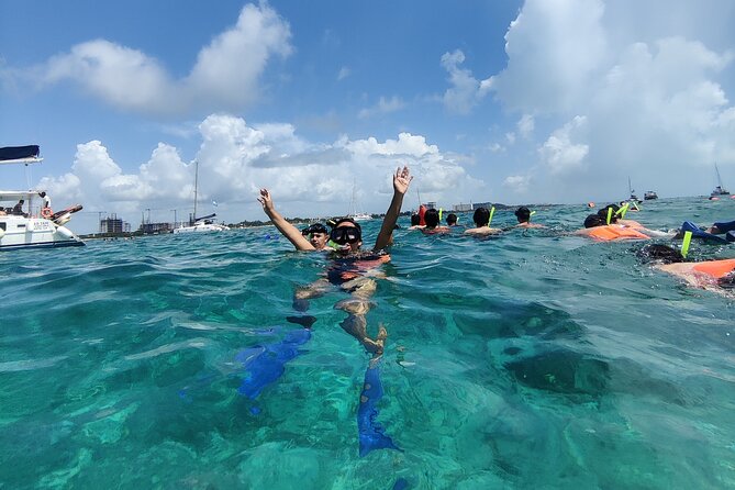 Top Isla Mujeres Catamaran Tour with Snorkel Open Bar and Buffet lunch - Morning in Cancún: check-in, transfers, and what to expect