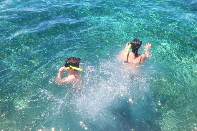 Tour to Cozumel by Catamaran with Snorkeling and Buffet Lunch - Mia Beach Club and Cielito: lunch, showers, and a protected area