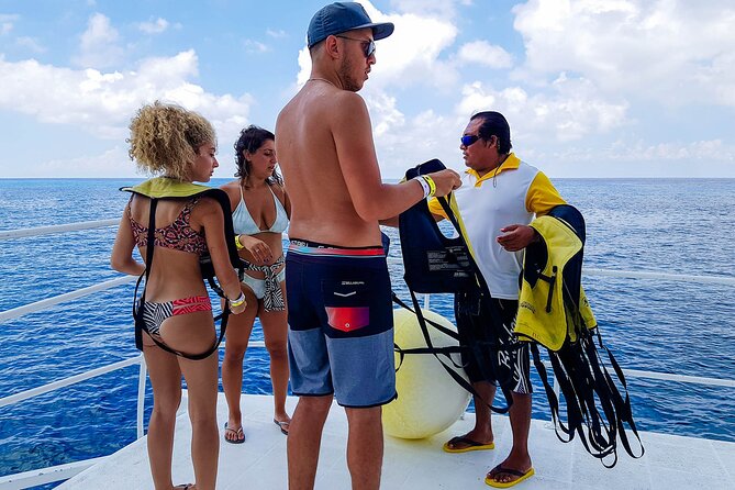 Tour to Cozumel by Catamaran with Snorkeling and Buffet Lunch - Catamaran ride: what to expect onboard