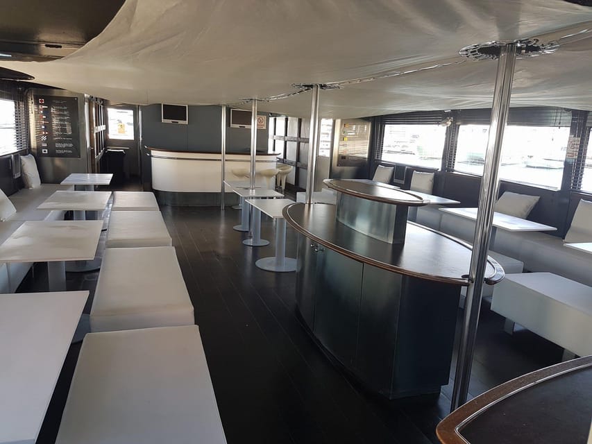 Valencia: Catamaran Cruise, Paella Lunch and Swim Stop - Lunch at Sea: Salad, Chicken Paella, and Fresh Fruit