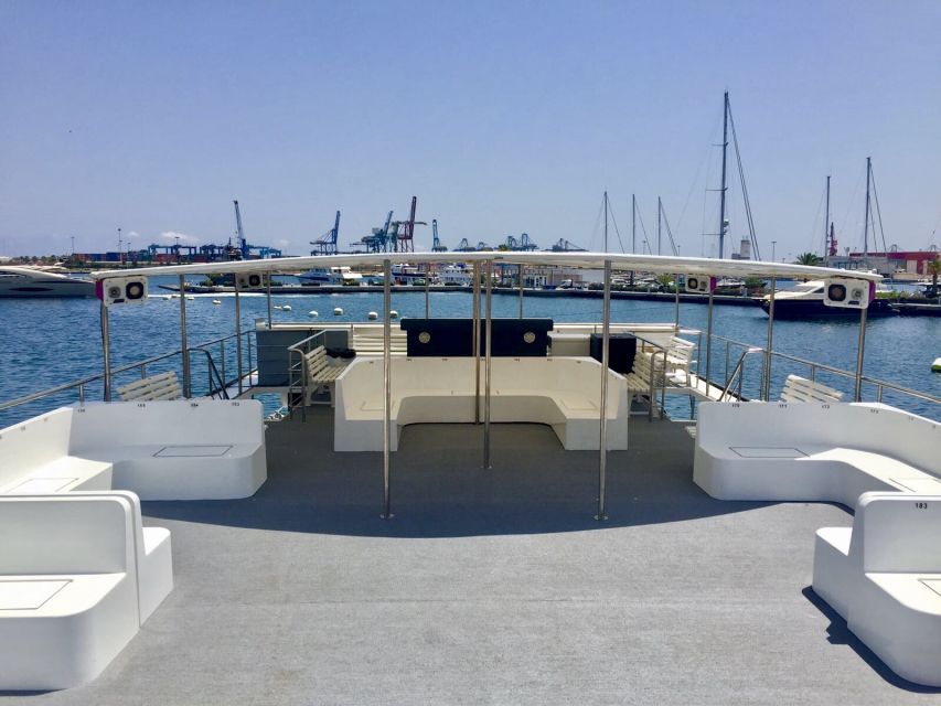 Valencia: Catamaran Cruise with Stop for Swimming - Getting on board at La Marina: Clock Building and the BORAMAR stand