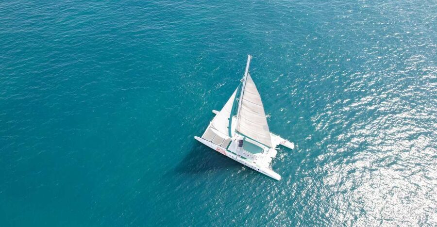 Valencia: Sailing Catamaran Cruise with Valencian Lunch - Lunch onboard: vegetable salad, paella, bread, and fruit (plus a drink)