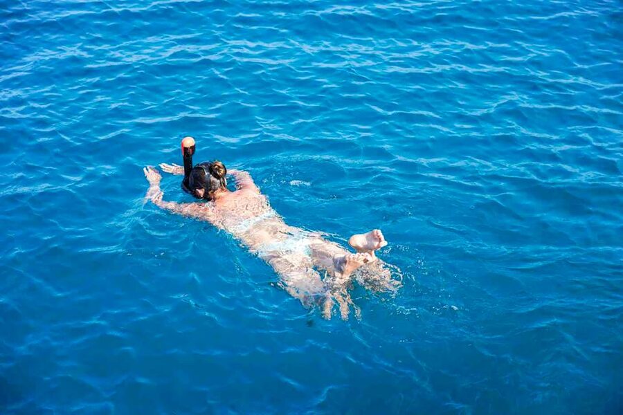 Valencia: Sailing Catamaran with Swimming & Optional DJ - The swim stop: jump-off fun, with a few smart expectations