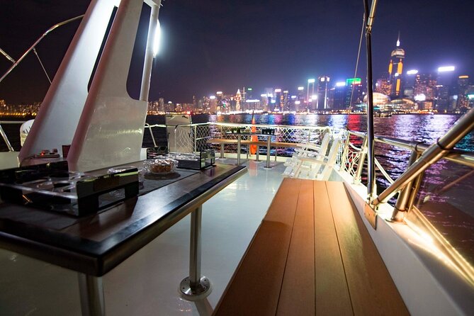 Victoria Harbour Yacht Night Cruise - DREAMER：Tourguide & Photos - What’s included onboard: beer, snacks, Wi‑Fi, and a photo assistant