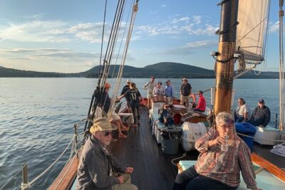 Windjammer Classic Sunset Sail from Camden, Maine - The Appledore II experience: help raise sails and take the wheel